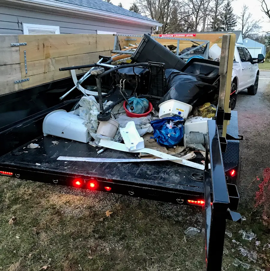 Roll-off dumpster delivered to a residential driveway in Mount Morris