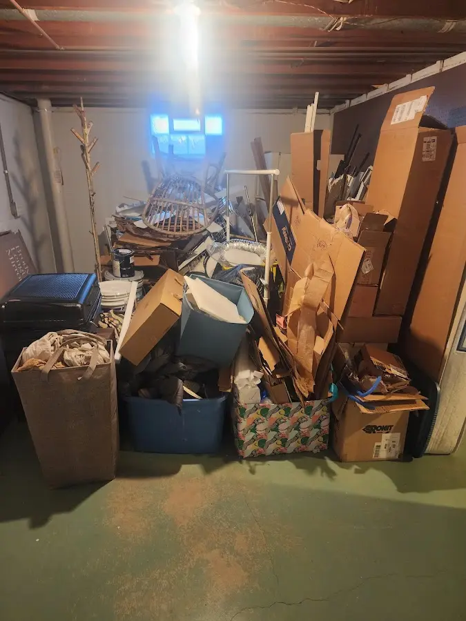 Roll-off dumpster container at job site for 15 Yard Dumpster Rental in Mount Morris